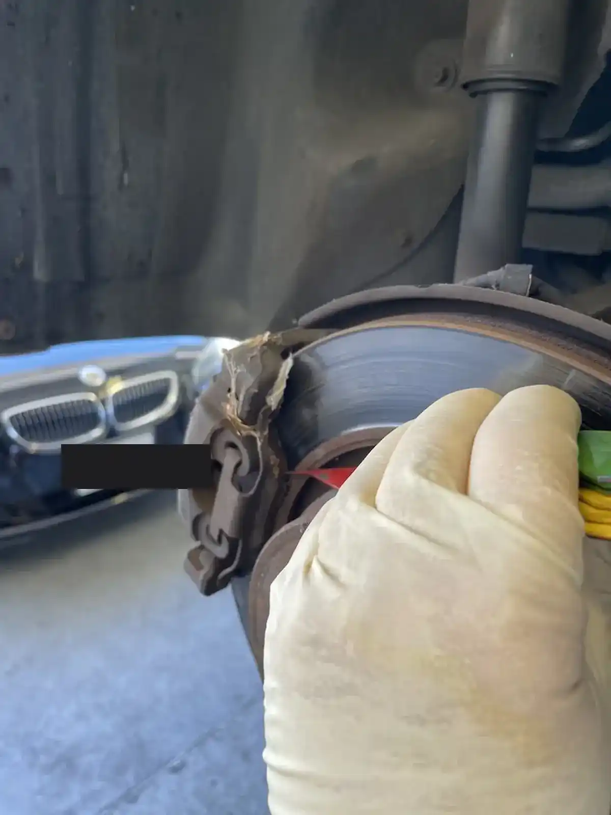 Brake pad and rotor inspection on a BMW